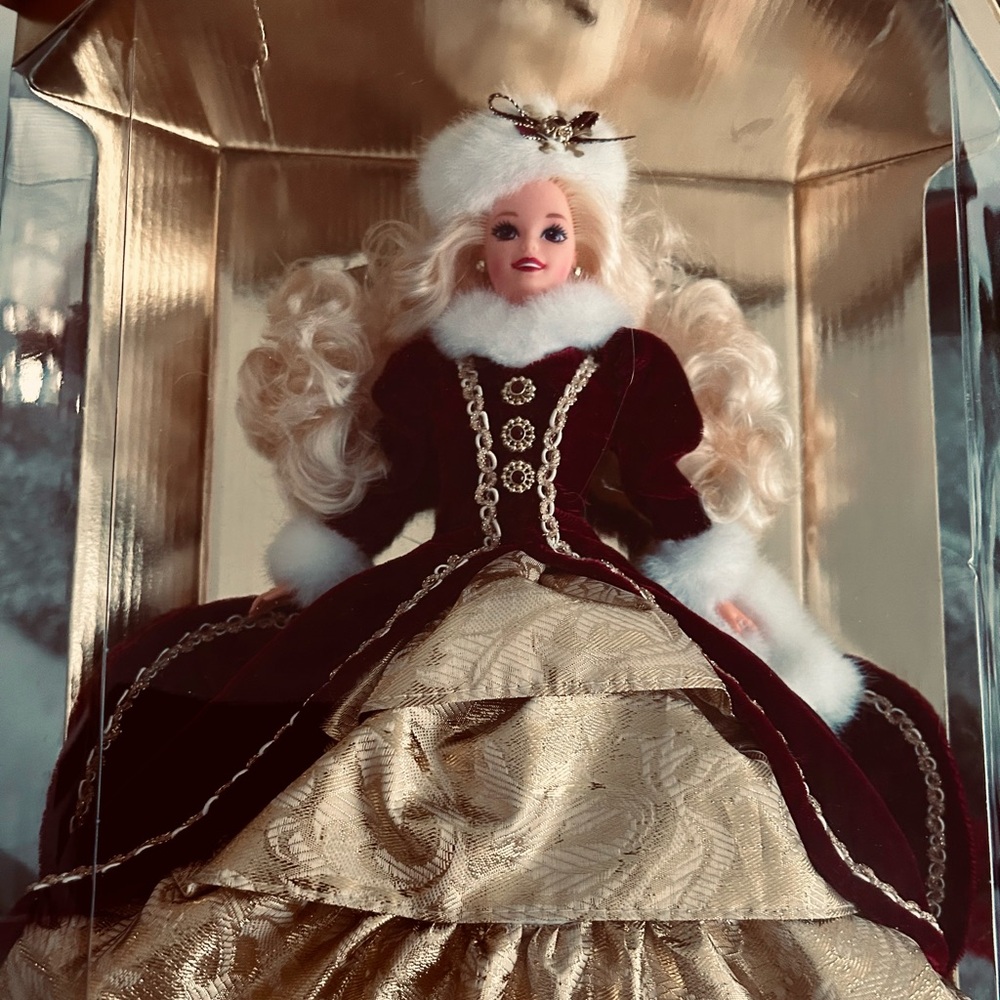 1995 limited edition holiday Barbie, new inbox. burgundy and gold trimmed gown